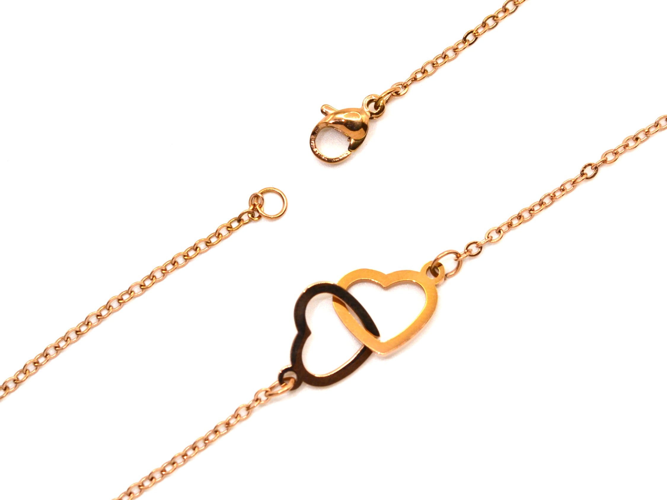 Halskette - 18K Roségold - verschlungene Herzanhänger - Damen